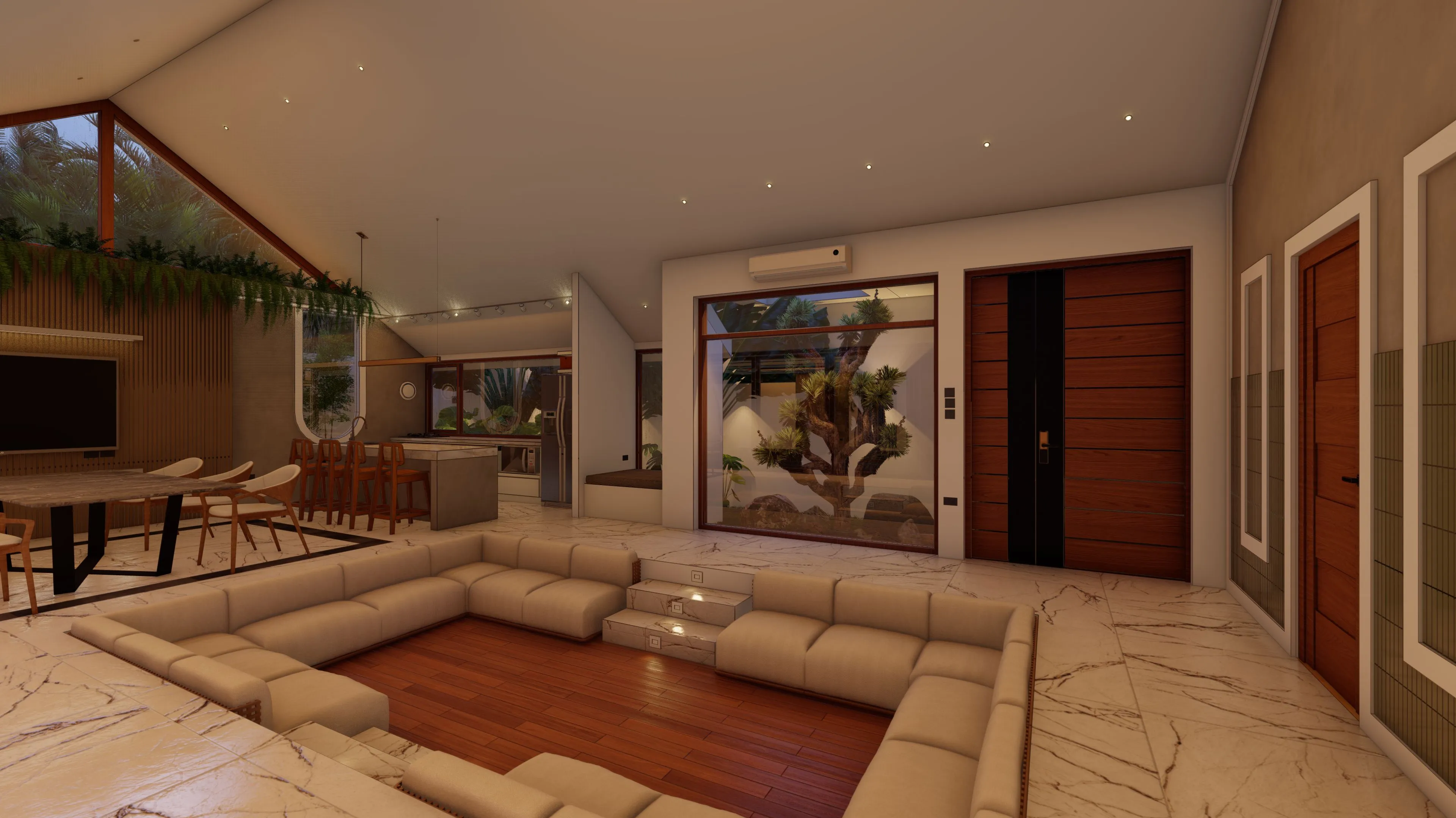 Sunken conversation pit lounge with modern furniture and indoor plants leading to the living area
